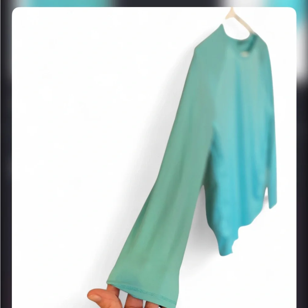 Under Armour Women's Long-Sleeve Performance Tee in Teal Blue - Picture 2 of 7